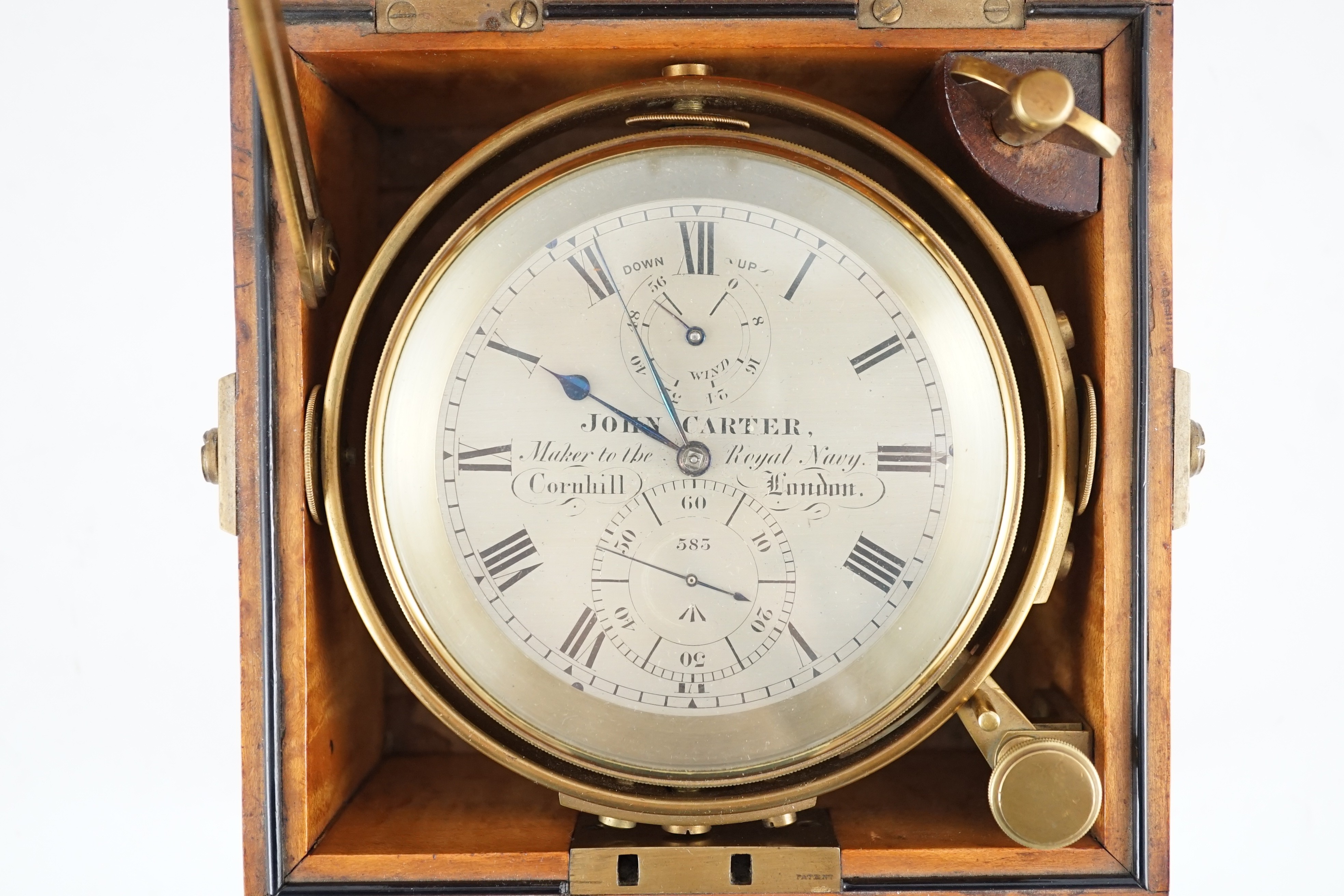 John Carter, Cornhill, London. Maker to the Royal Navy. A brass bound birds eye maple cased two day Marine Chronometer, width 16cm depth 16cm height 16.5cm